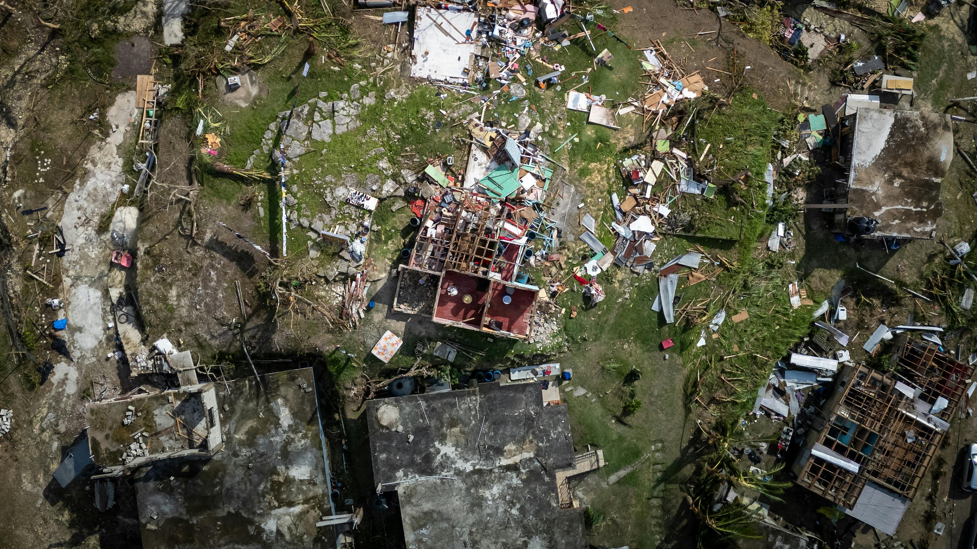 Aerial view of hurricane-damaged roof